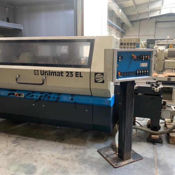 Strugarka czterostronna Weinig Unimat 23EL z podajnik Weinig EM12